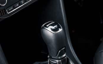 black and silver car gear shift lever