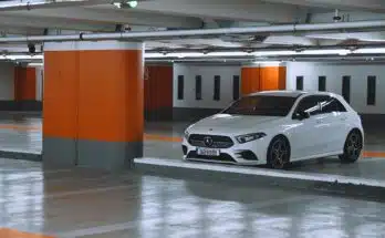 white bmw m 3 parked in garage